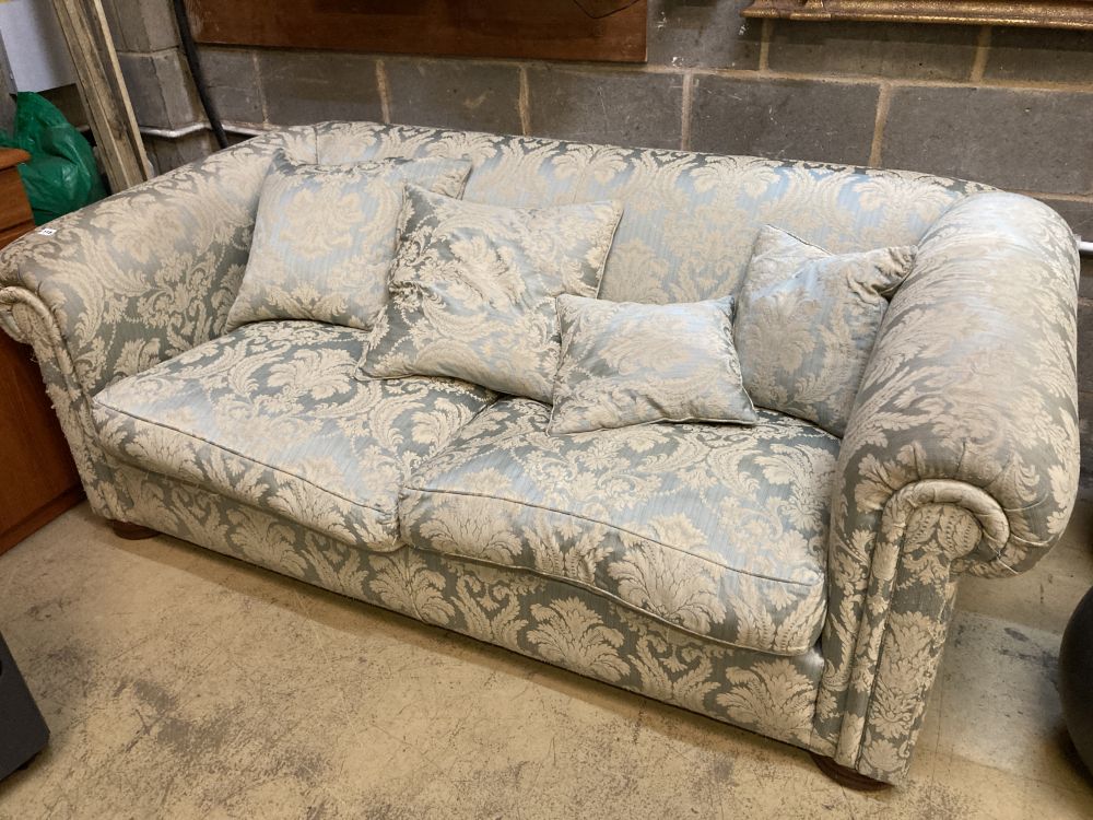 An early 20th century upholstered Chesterfield settee, length 200cm, depth 110cm, height 70cm